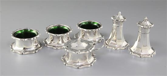 An Art Nouveau George V silver six piece cruet set, pepper height 82mm, weight 10.1oz/317grms.